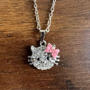 Retro silver toned hello kitty rhinestone necklace